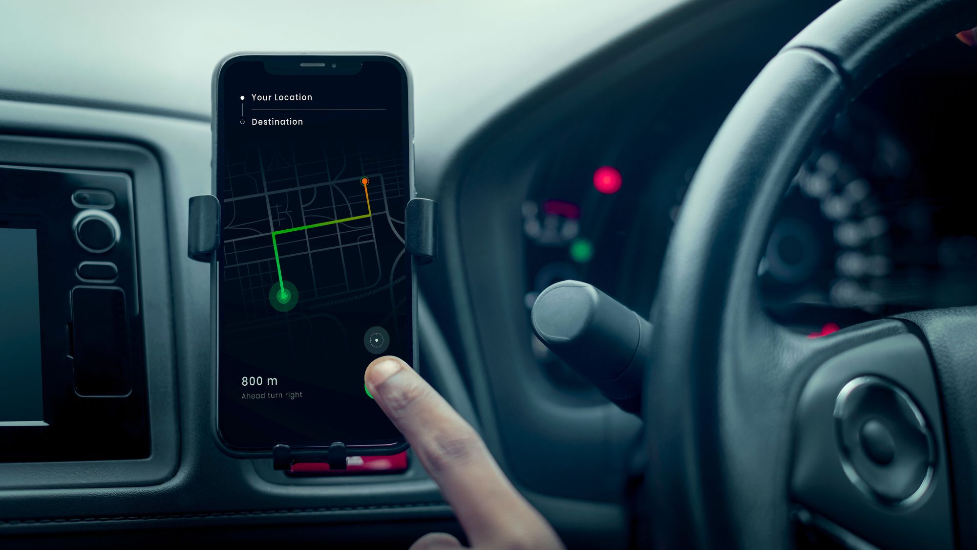 A man using checking the role of GPS technology in modern car trackers