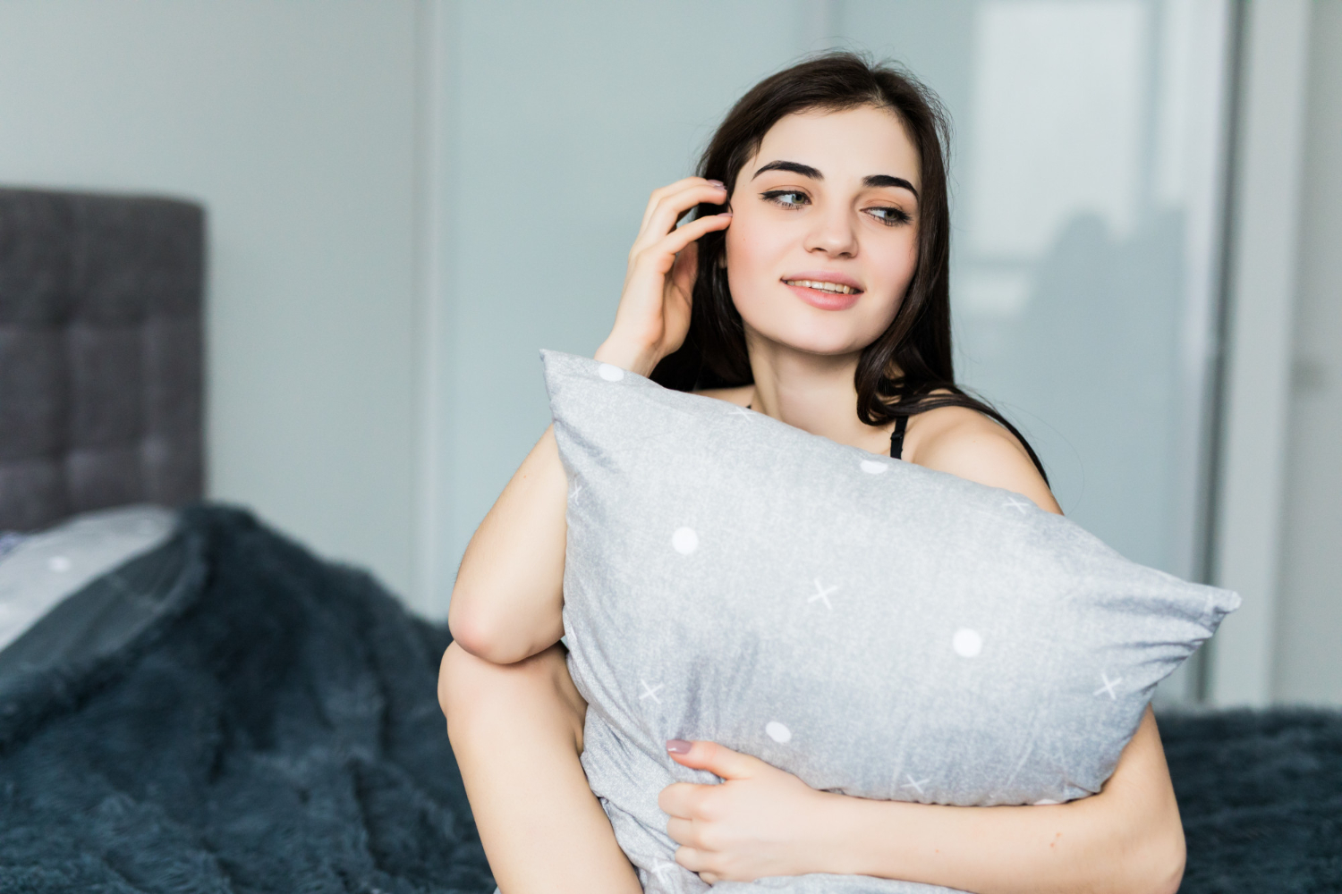 A girl holding Box Pillow Case of Fresh Linens